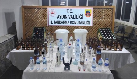 Aydın'da sahte içki imal ettiği öne sürülen 2 şüpheli yakalandı